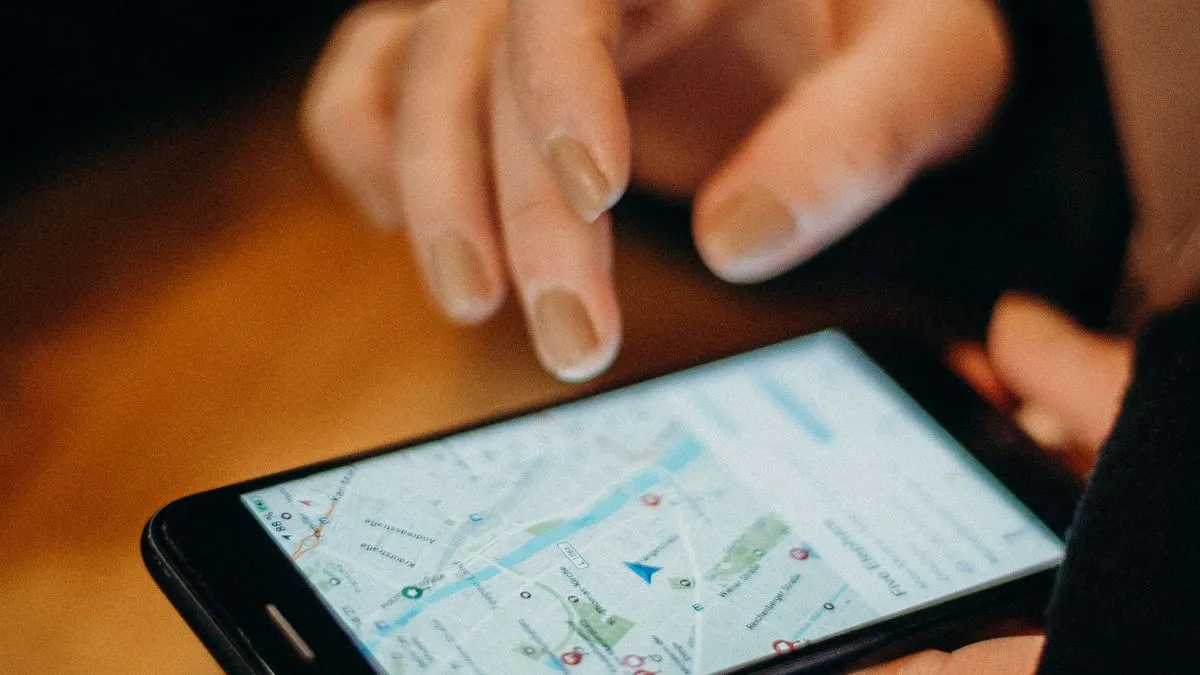 Smartphone showing a map location, representing a Google Business Profile